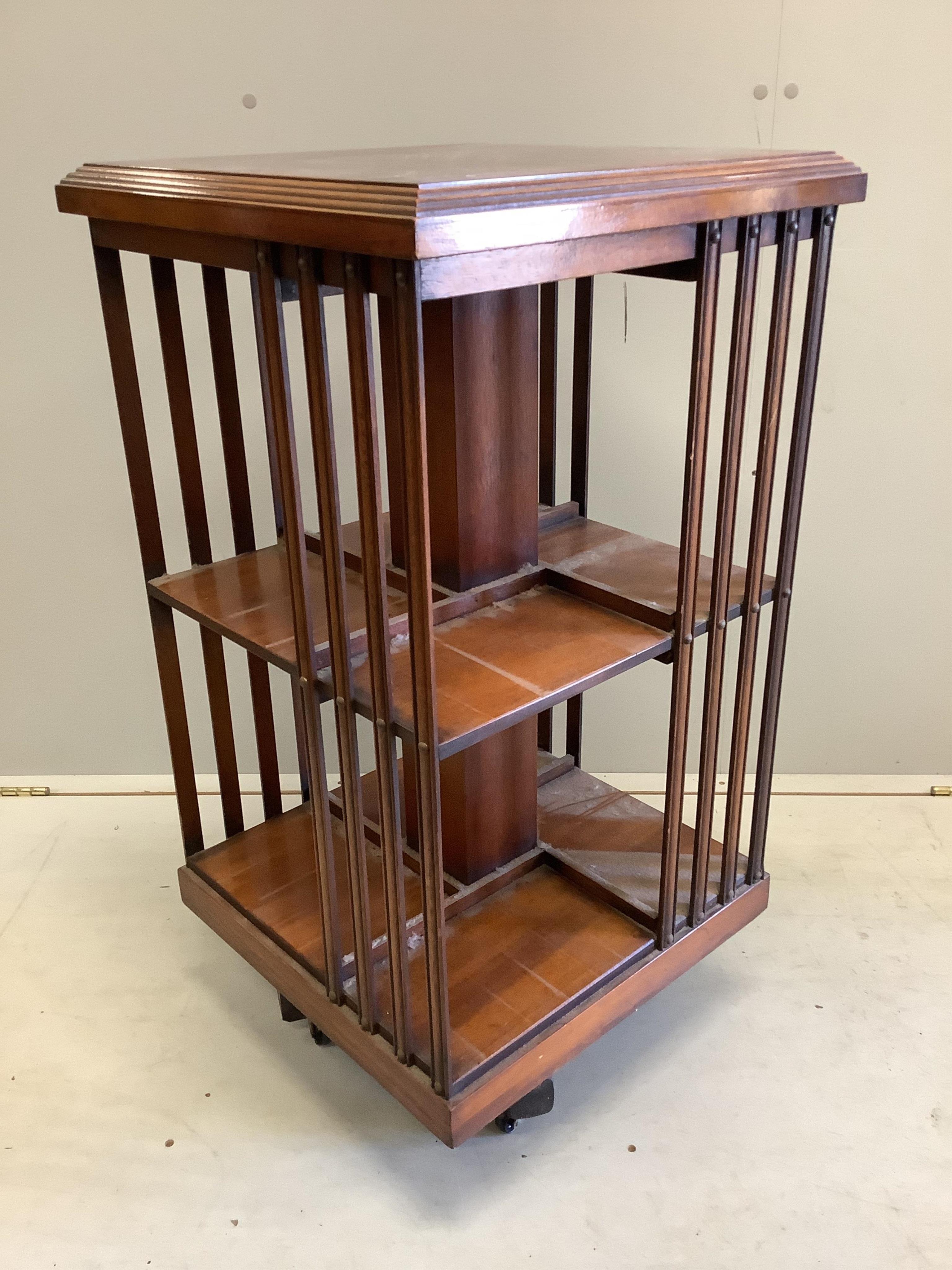 A modern burr walnut square two tier revolving bookcase, width 46cm, depth 46cm, height 85cm